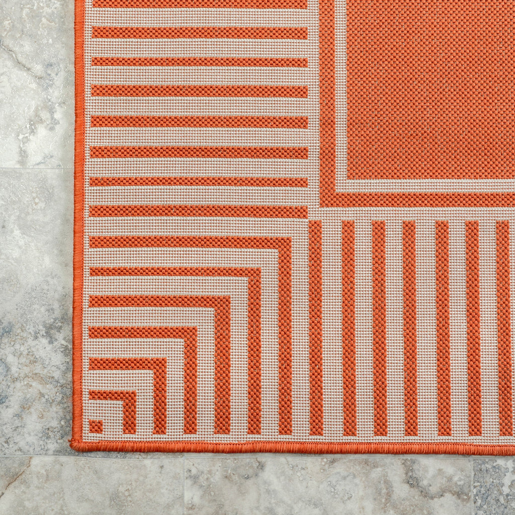 Tapis d'intérieur/extérieur classique à bordures Nuloom Leah