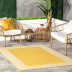 Tapis d'intérieur/extérieur classique à bordures Nuloom Leah