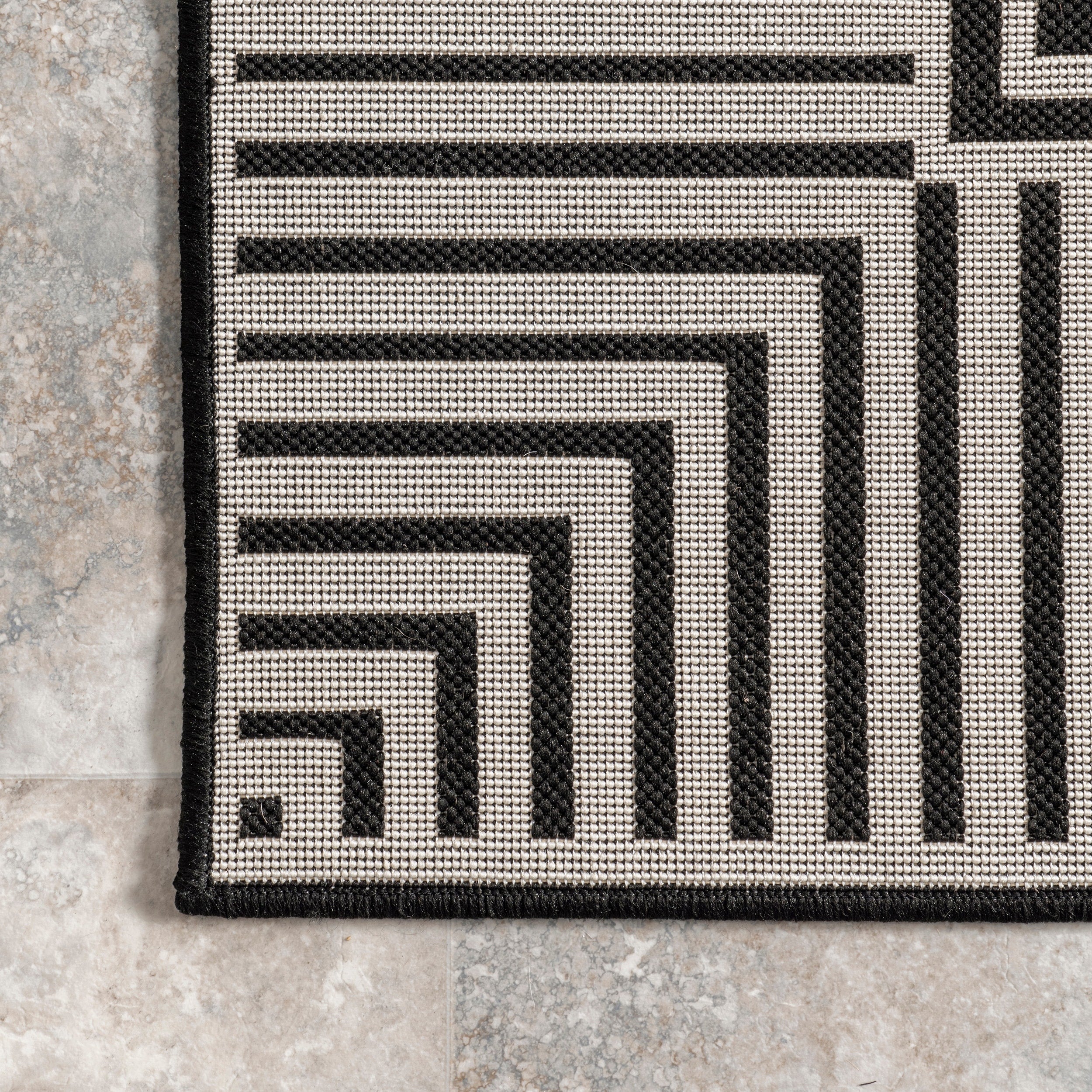 Tapis d'intérieur/extérieur classique à bordures Nuloom Leah