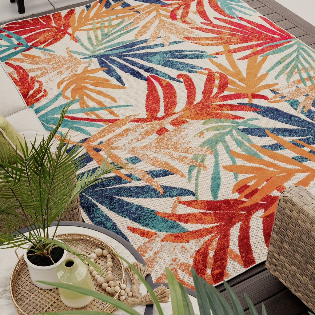 Tapis d'intérieur/extérieur à motif floral côtier Origin.