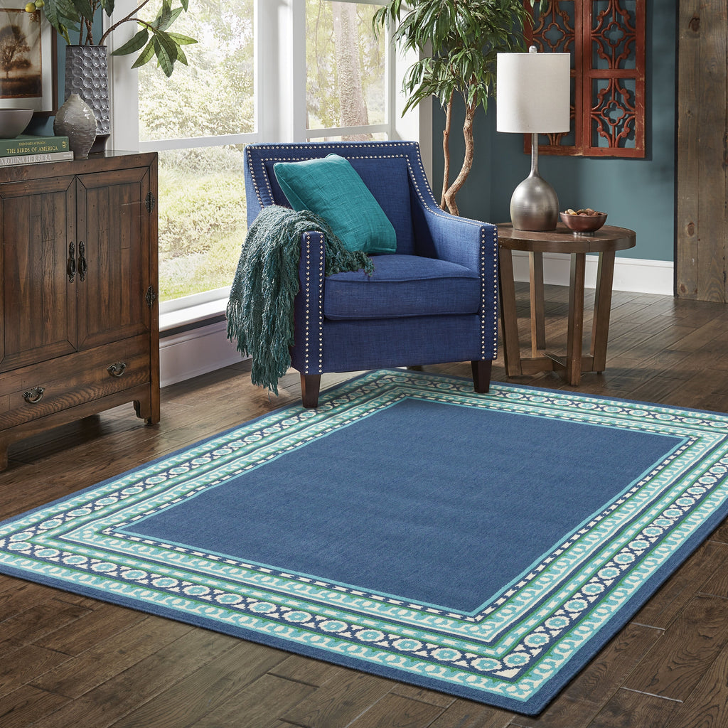 Tapis d'intérieur/extérieur Style Haven Martinque à bordure verte bleu marine ~