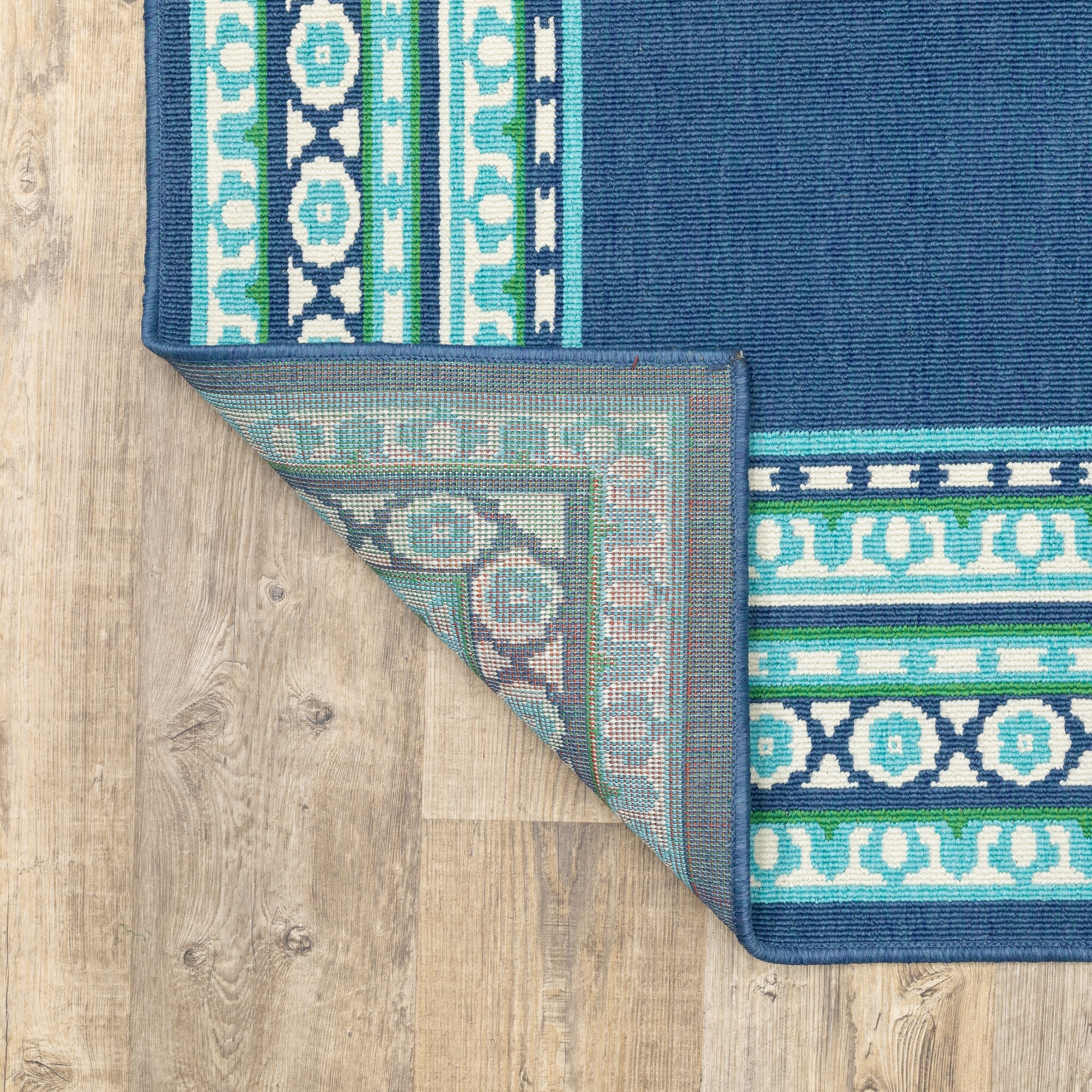 Tapis d'intérieur/extérieur Style Haven Martinque à bordure verte bleu marine ~